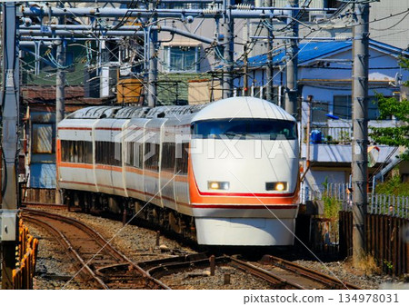 A different view from usual: "Train departing from Ueno" JR Tohoku Main Line, Up Line... Tobu Limited Express [Spacia] 100 Series 134978031
