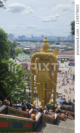 Lord Murugan golden statue stands majestically 134979605
