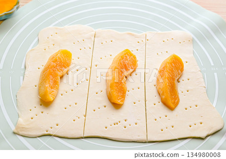 Apple compote on pastry sheet 134980008