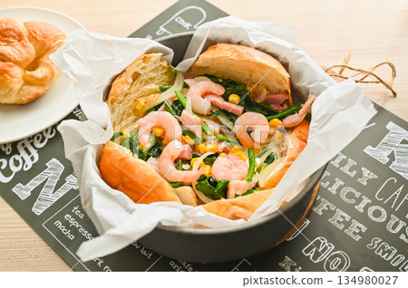 Making croissant quiche 134980027