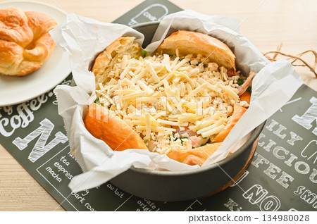 Making croissant quiche Making croissant quiche 134980028