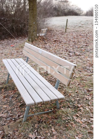 Frosty Park Bench in Winter Landscape Frosty Park Bench in Winter Landscape 134980510