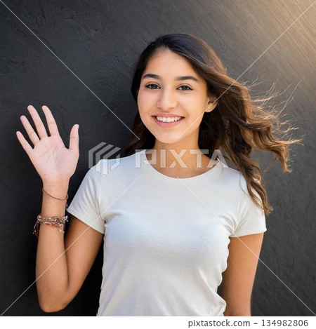 Beautiful woman waving her hand 134982806