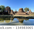 Mirror phenomenon at Wat Mahathat in Sukhothai Historical Park 134983065