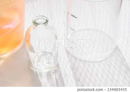 Sunlit windowsill and glass containers 134983435
