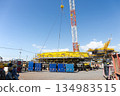 Offshore platform under construction with crane. 134983515
