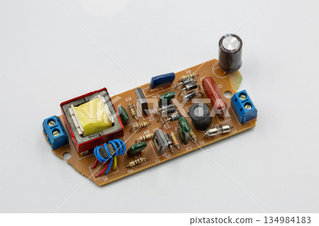 Old electronic component microcircuit closeup. 134984183