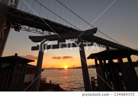 Kanmon Bridge, torii gate and sunset in Moji Ward, Kitakyushu City, Fukuoka Prefecture Kanmon Bridge, torii gate and sunset in Moji Ward, Kitakyushu City, Fukuoka Prefecture 134984355