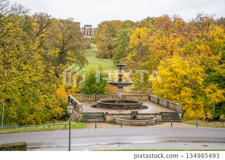 Fountain in the autumn park Sanssouci Palace Potsdam, Germany. Nature garden yellow trees Fountain in the autumn park Sanssouci Palace Potsdam, Germany. Nature garden yellow trees 134985493