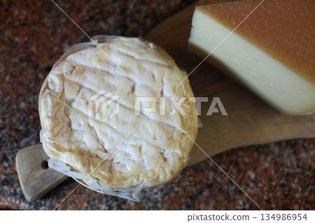 swiss and french wooden board variety cheese ready to eat swiss and french wooden board variety cheese ready to eat 134986954