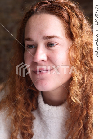 red curly hair beauty girl outdoors at spring season  134987375
