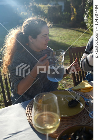 red curly hair beauty girl outdoors at spring season  134987494