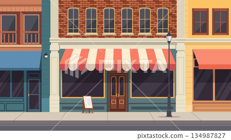 Vintage City Storefront and Shop Facade.Charming Retro Boutique with Striped Awning on a City Street.Flat Design Urban Streetscape with Classic Small Business Shops Vintage City Storefront and Shop Facade.Charming Retro Boutique with Striped Awning on a City Street.Flat Design Urban Streetscape with Classic Small Business Shops 134987827