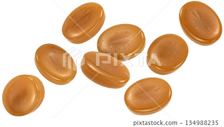 Falling caramel candies isolated on white background with clipping path, collection, full depth of field Falling caramel candies isolated on white background with clipping path, collection, full depth of field 134988235