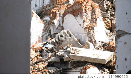View to destroyed church at Kharkivska oblast. Ruined building after bomb attacks on ukrainian territory from russia army. Consequences of russian invasion of Ukraine. Slow motion View to destroyed church at Kharkivska oblast. Ruined building after bomb attacks on ukrainian territory from russia army. Consequences of russian invasion of Ukraine. Slow motion 134990433