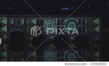 Very beautiful night laser show on the facade of the house. Beautiful laser and musical fountain show. 3D videomapping. Strasbourg, France. Very beautiful night laser show on the facade of the house. Beautiful laser and musical fountain show. 3D videomapping. Strasbourg, France. 134990658