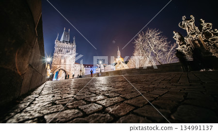 Night, Crowds and City Life on Iconic Charles Bridge, Prague. People, street performers, illuminated 134991137