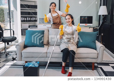 Cleaners clean empty office spaces 134991430