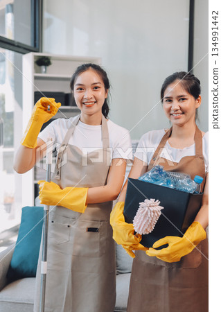 Cleaners clean empty office spaces Cleaners clean empty office spaces 134991442