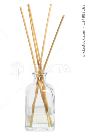 Glass aroma diffuser with wooden sticks on isolated background Glass aroma diffuser with wooden sticks on isolated background 134992165
