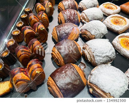 Gourmet puff pastry with chocolate and cream filling. 134992300