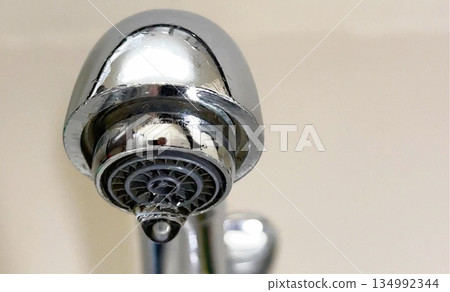 Water Drop From Faucet Aerator 134992344