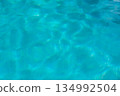 Pool water shimmers in the holiday sunlight, summer background 134992504