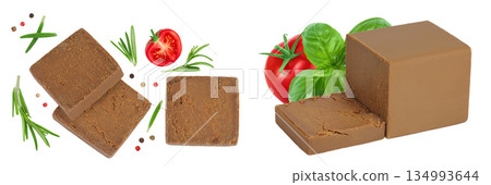 Brown cheese. Norwegian brunost isolated on white background. Top view. Flat lay Brown cheese. Norwegian brunost isolated on white background. Top view. Flat lay 134993644