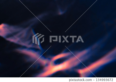 colorful warm pink rainbow light leaks on black background 134993672