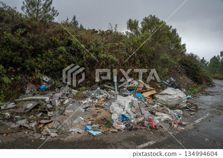 illegal dump on the side of the road illegal dump on the side of the road 134994604