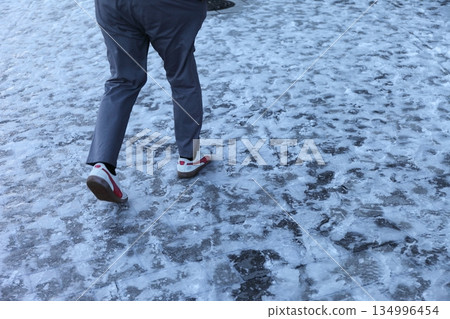 Frozen road surface Frozen road surface 134996454