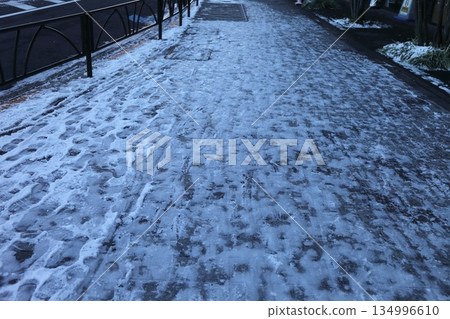 Frozen road surface Frozen road surface 134996610