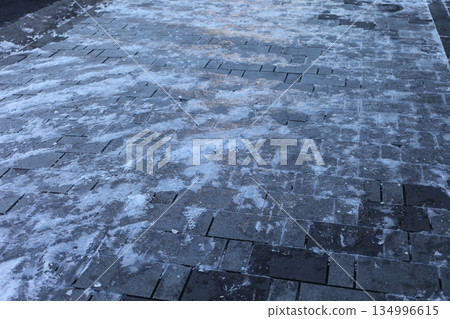 Frozen road surface Frozen road surface 134996615