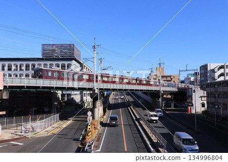 Hankyu Takarazuka Line 7000 series train running between Ishibashi-Handaimae and Ikeda 134996804