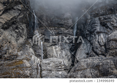Dramatic landscape of the cliff in the landslide area covering an old Langtang village, Nepal. The 2015 earthquake triggered a catastrophic avalanche and landslide destroyed Langtang village. 134996849