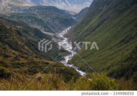 Scenery view of Langtang Khola river a river coming from the south flows down along the Langtang trekking route, Nepal. Scenery view of Langtang Khola river a river coming from the south flows down along the Langtang trekking route, Nepal. 134996850