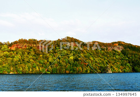 Aomori Prefecture, Towada City, Lake Towada, Lake Nakako, Mikura Peninsula, Eboshi Rocks dyed in the sunset 134997645