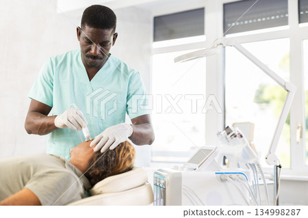 cosmetic doctor skillfully performed 134998287