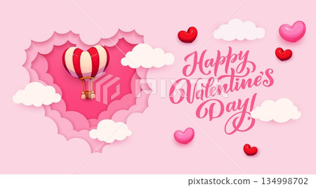 Paper cut valentine day banner with air balloon and pink sky clouds. Romantic vector message with hot air balloon floating through pink and white fluffy clouds within 3d layered heart shaped frame 134998702