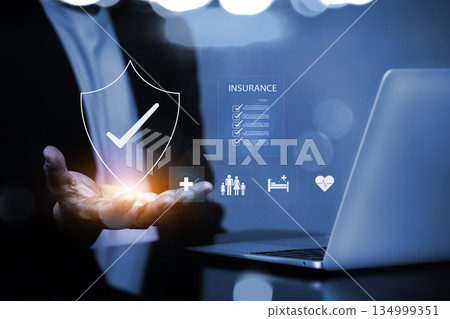 Health Insurance Protection Concept with Hand Holding Digital Shield and Medical Icons 134999351