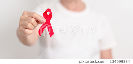 Elderly with Red Ribbon for December World Aids Day, MADD, October Red ribbon week, February Heart month, Marfan Syndrome, May Stroke awareness, March world TB Tuberculosis day and April Dare day Elderly with Red Ribbon for December World Aids Day, MADD, October Red ribbon week, February Heart month, Marfan Syndrome, May Stroke awareness, March world TB Tuberculosis day and April Dare day 134999884