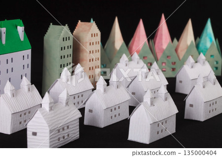 Handmade paper craft (miniature) house, townscape, black background Handmade paper craft (miniature) house, townscape, black background 135000404