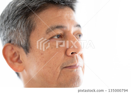 A manager with a confident and hopeful expression A manager with a confident and hopeful expression 135000794