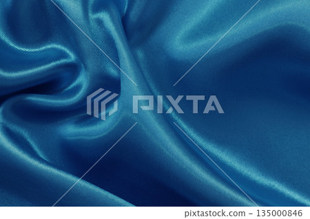 Blue fabric cloth texture for background and design art work, beautiful crumpled pattern of silk or linen. Blue fabric cloth texture for background and design art work, beautiful crumpled pattern of silk or linen. 135000846