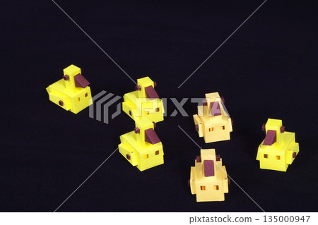 Miniature duck paper craft handmade animal model black background white background 135000947