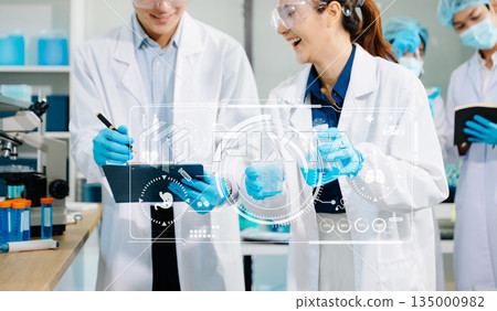 Laboratory team analyzing samples with digital science icons, biotech tools, and research equipment. Laboratory team analyzing samples with digital science icons, biotech tools, and research equipment. 135000982