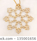 Handmade beaded Christmas ornament made of transparent brown color 135001656