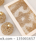 Handmade beaded Christmas ornament made of transparent brown color 135001657
