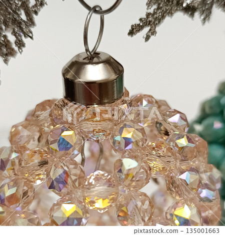 Handmade beaded Christmas ball. Cropped photo 135001663