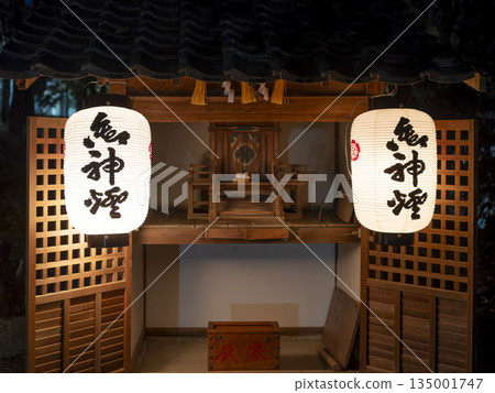 A small shrine with its doors open 135001747